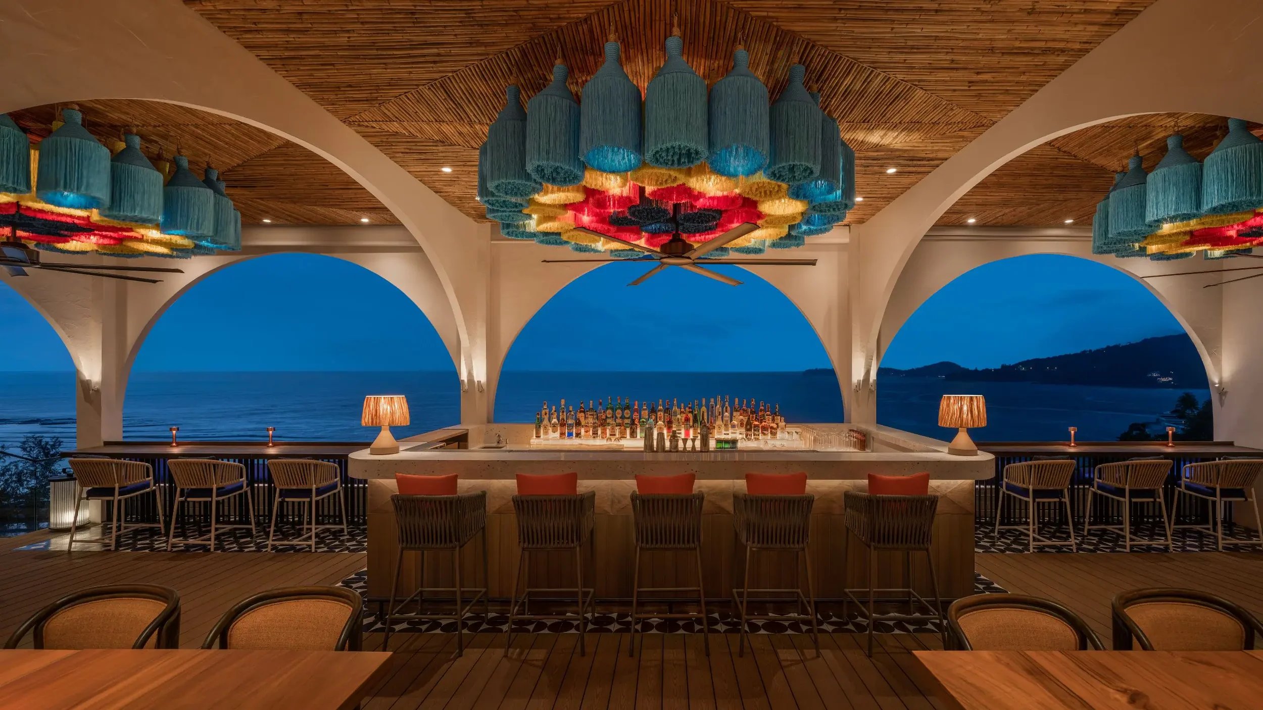 PHUHR-P0599-Casa-Boho-Bar-Top-Floor-Twilight.16x9.webp