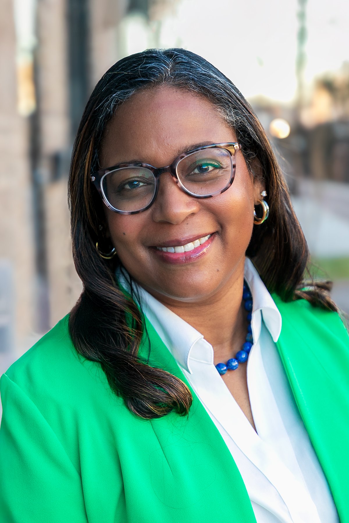 QENA JENNINGS | 
Executive Director