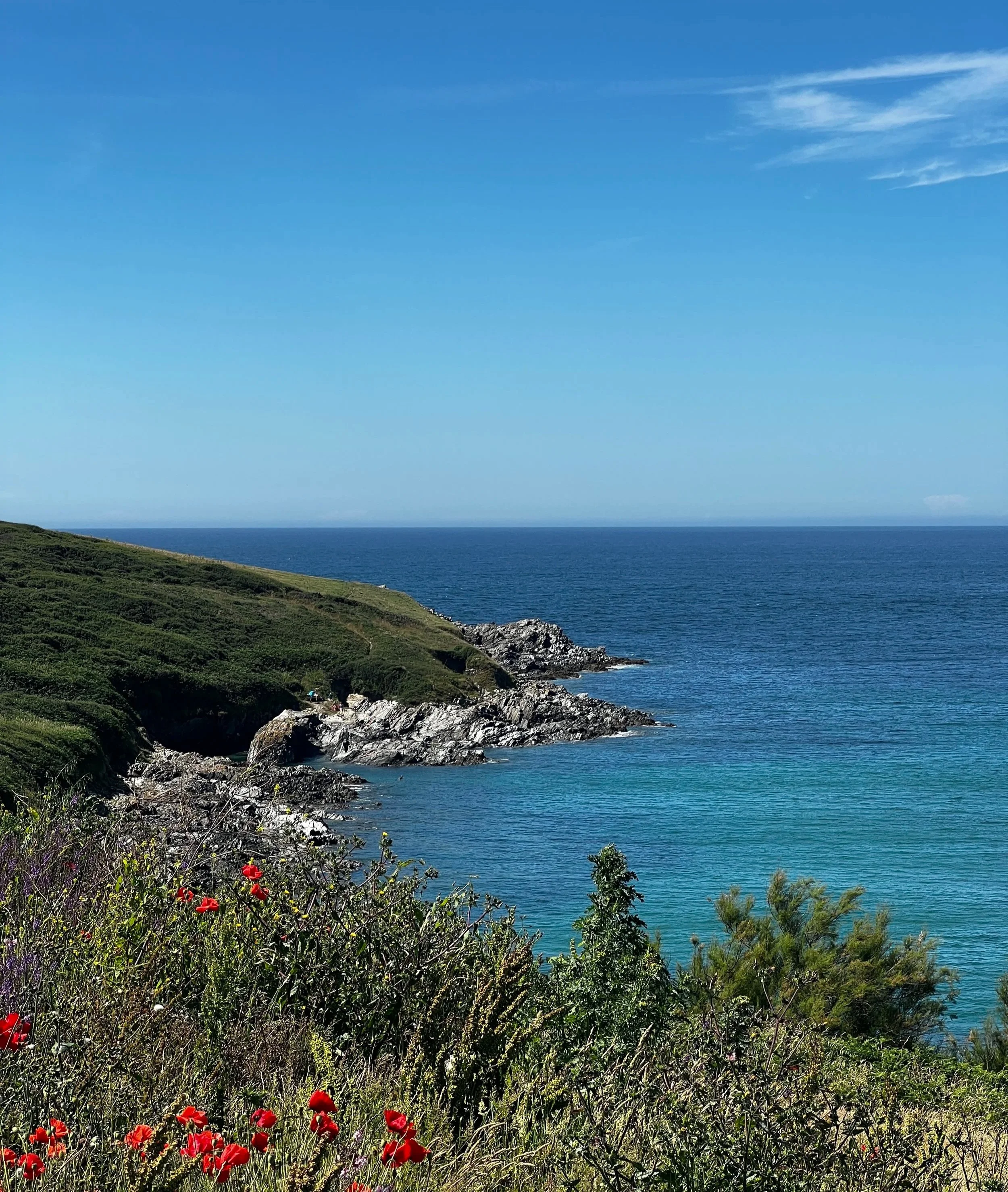 Beautiful blue sea view over West Pentire, the place of our retreat