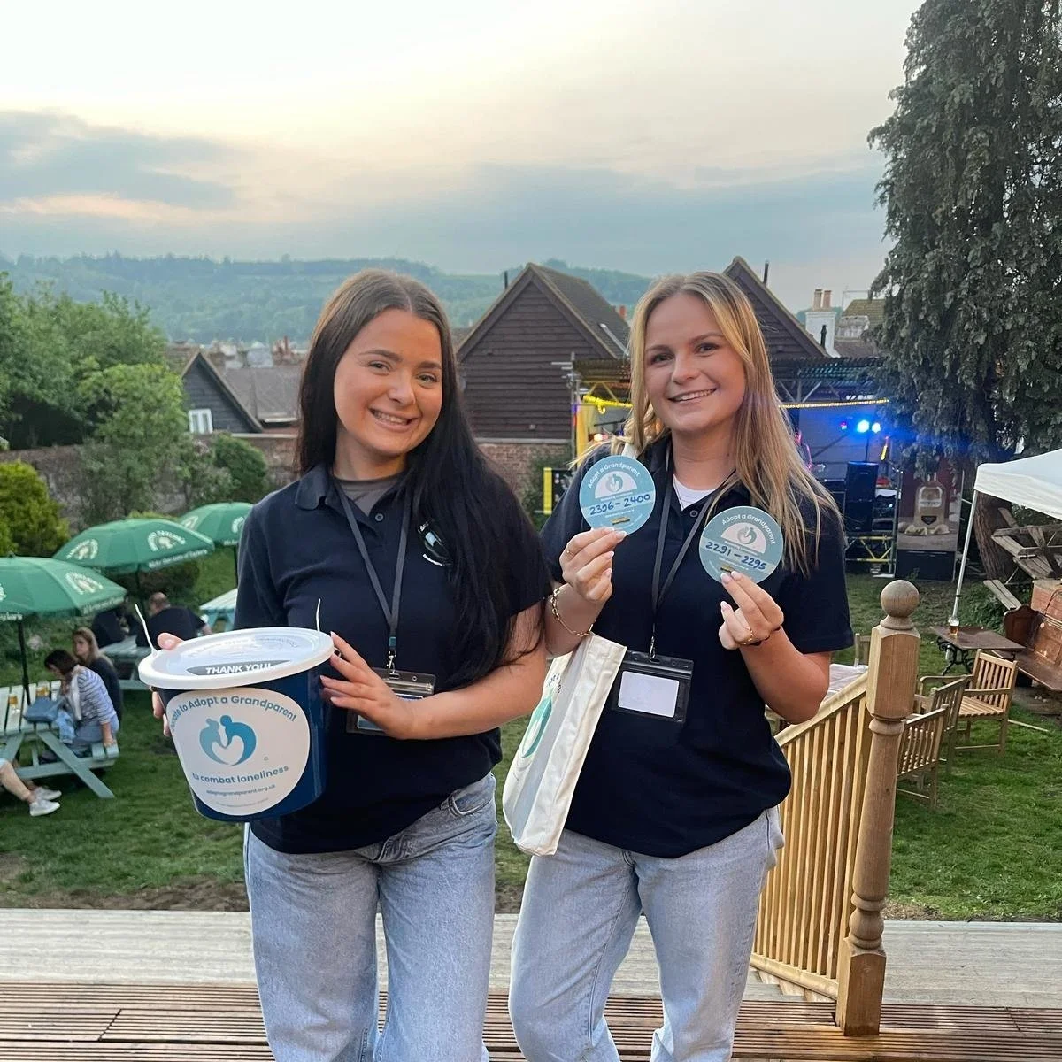 two girls volunteering at adopt a grandparent