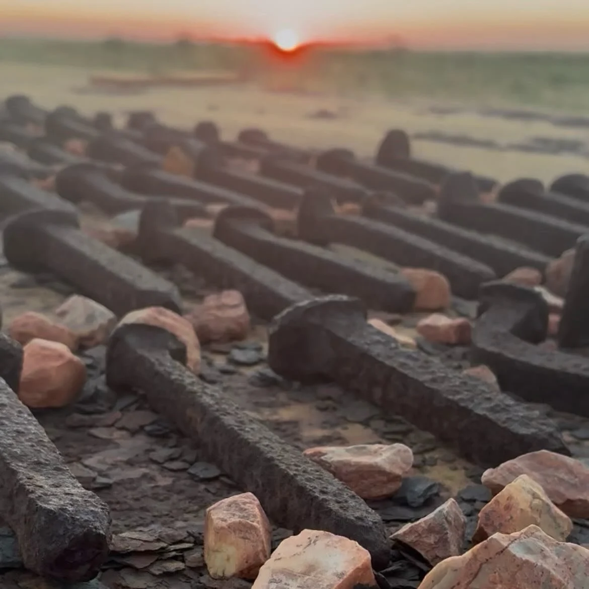Saturday evening, sunset drinks, and the South Hedland train installation. 
With my time in Hedland coming to an end it was decided to have another visit to the dog nail installation and watch the sun setting and the full moon raising. And to find mo