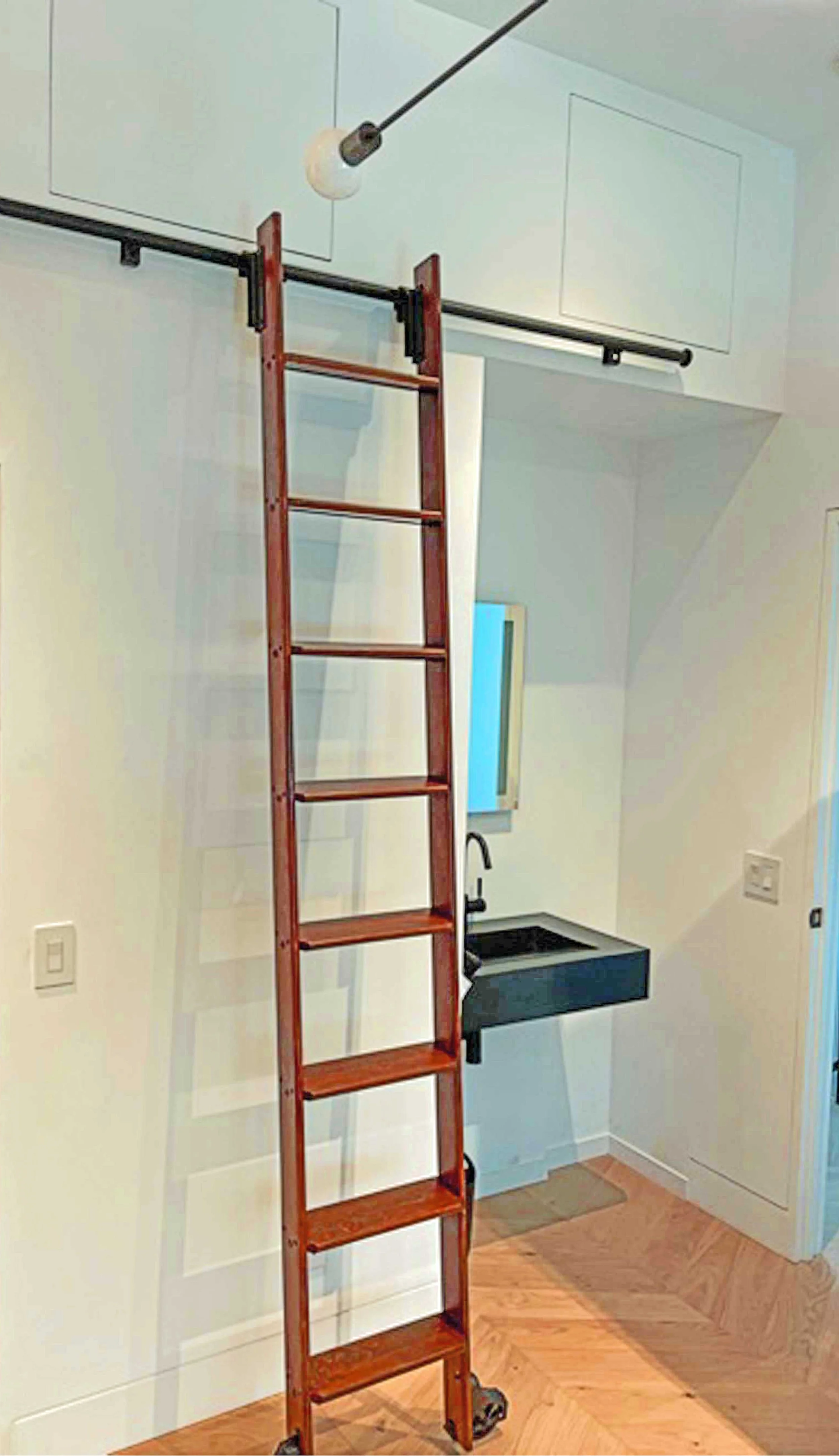 brown-stain-rolling-loft-ladder-for-storage.jpg