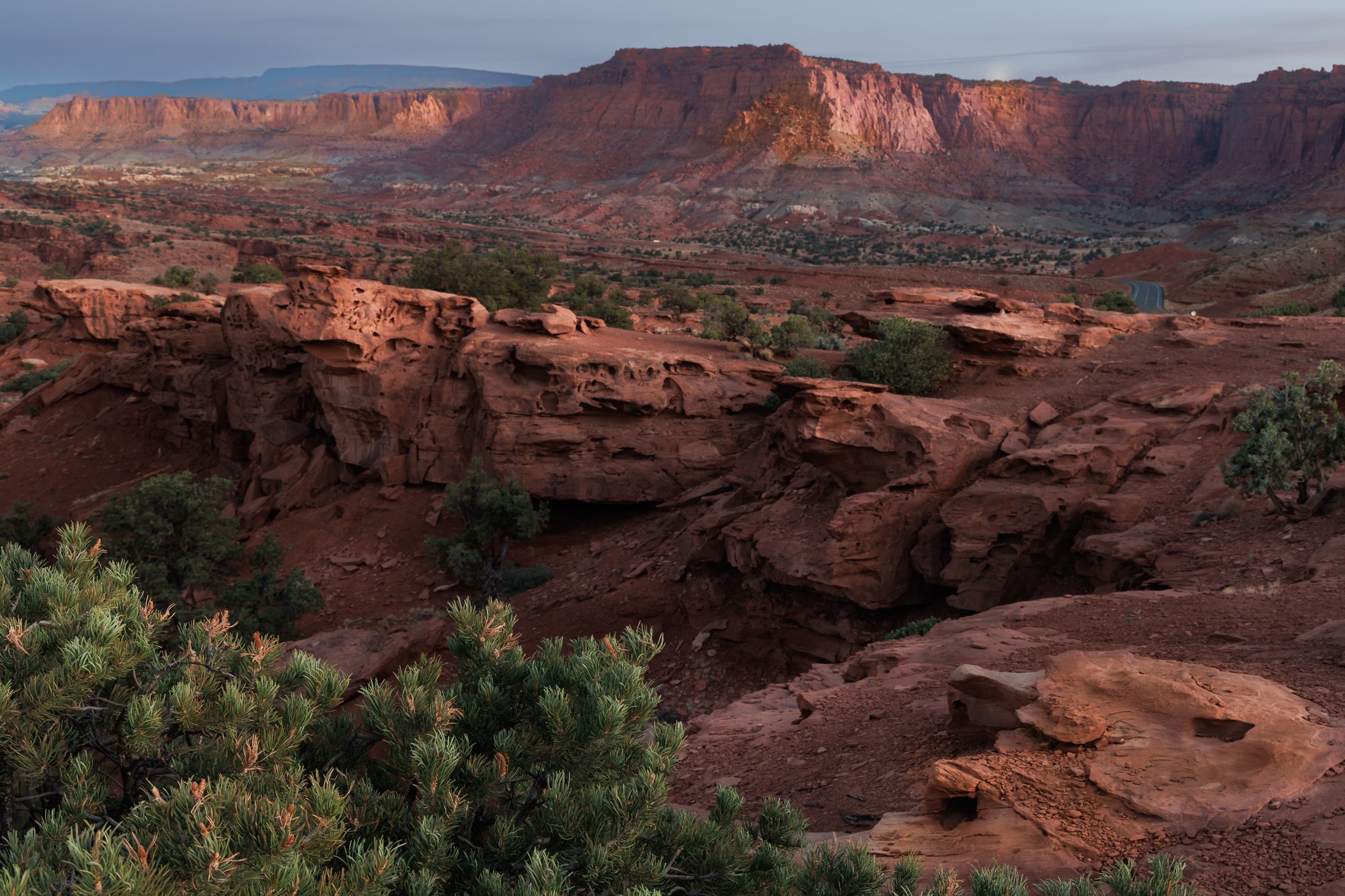 Sunrise on Waterpocket Fold View

Breathtaking doesn&rsquo;t even begin to cover it. Standing at Waterpocket Fold View at sunrise, you&rsquo;re treated to a sweeping panorama of colorful cliffs, canyons, domes, and the rugged Waterpocket Fold stretch