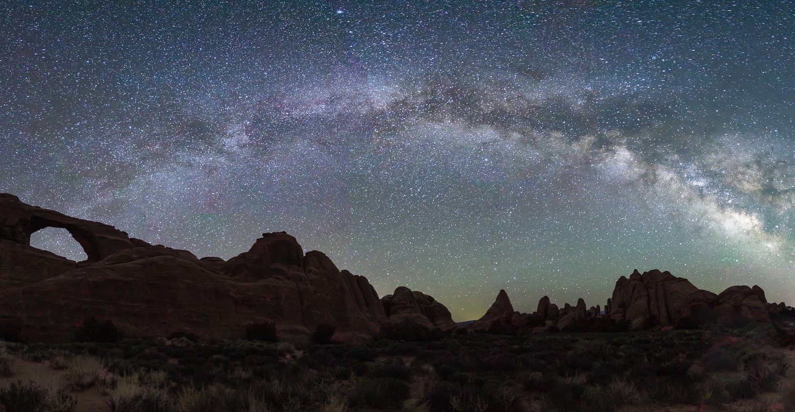 Milky Way over Skyline Arch, Arches NP, UT
I don't have a lens that would accommodate this scene in one shot, so I took about eight frames and stitched them together in post processing. It's a little cropped here, so check out my most recent blog pos