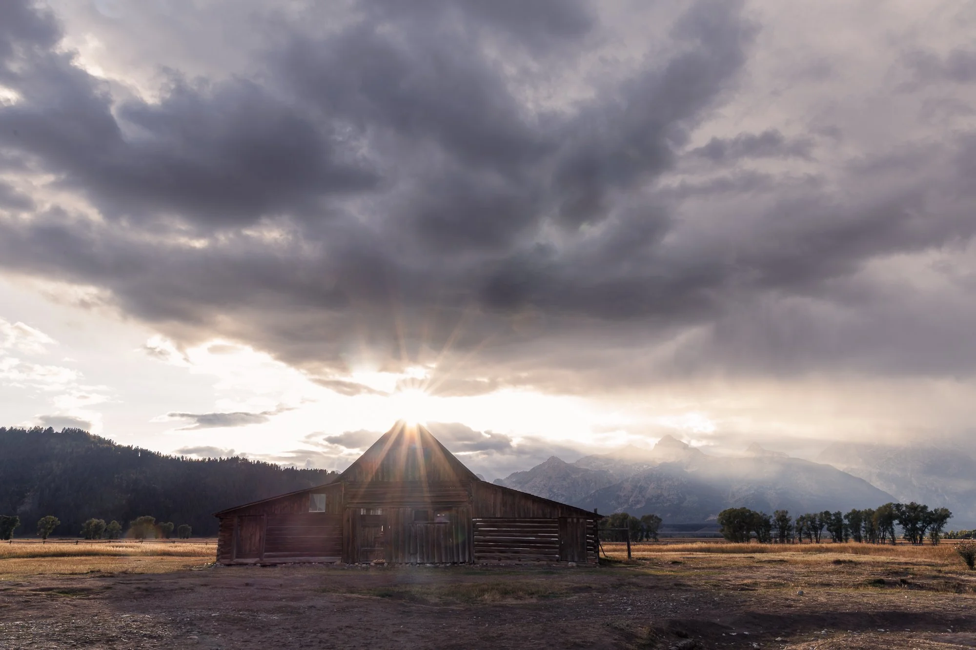 One of the most often photographed barns in the world, the John Moulton Barn. Do you supposed John Moulton had any idea his barn would become famous? Loved the drama of the clouds. But when the sun peeked through, I scrambled to get this photo.