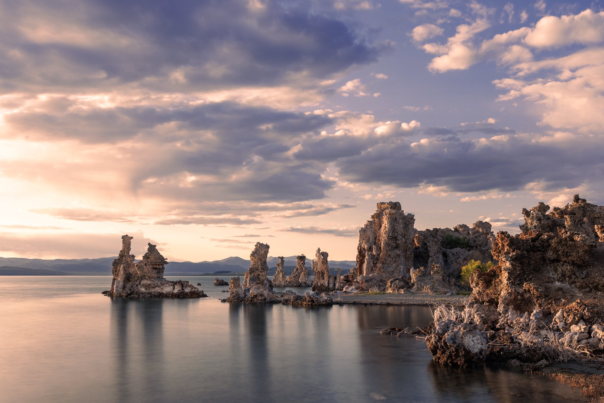 lakeside tufas with cloudy sky and long exposure