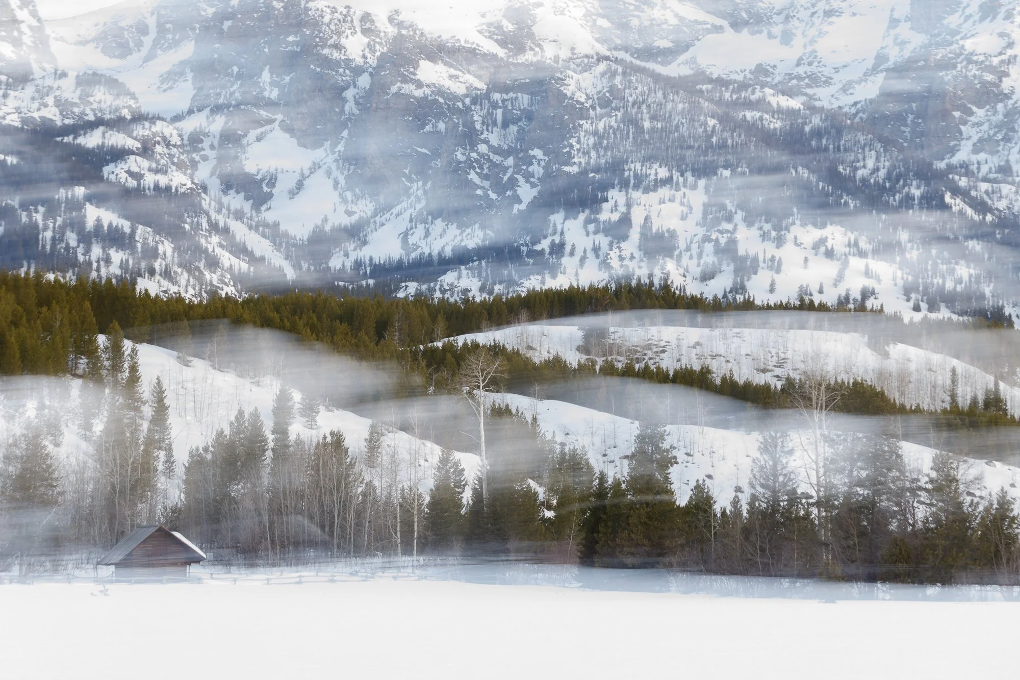 IM Layers of snowy hills and trees