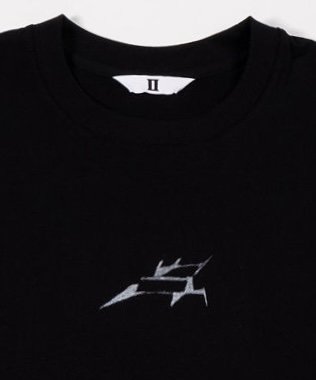Close up of black t-shirt with small silver angular holographic-style halftone ‘HOM’ logo on chest and large silver holographic-style halftone ‘HOM’ logo across upper back