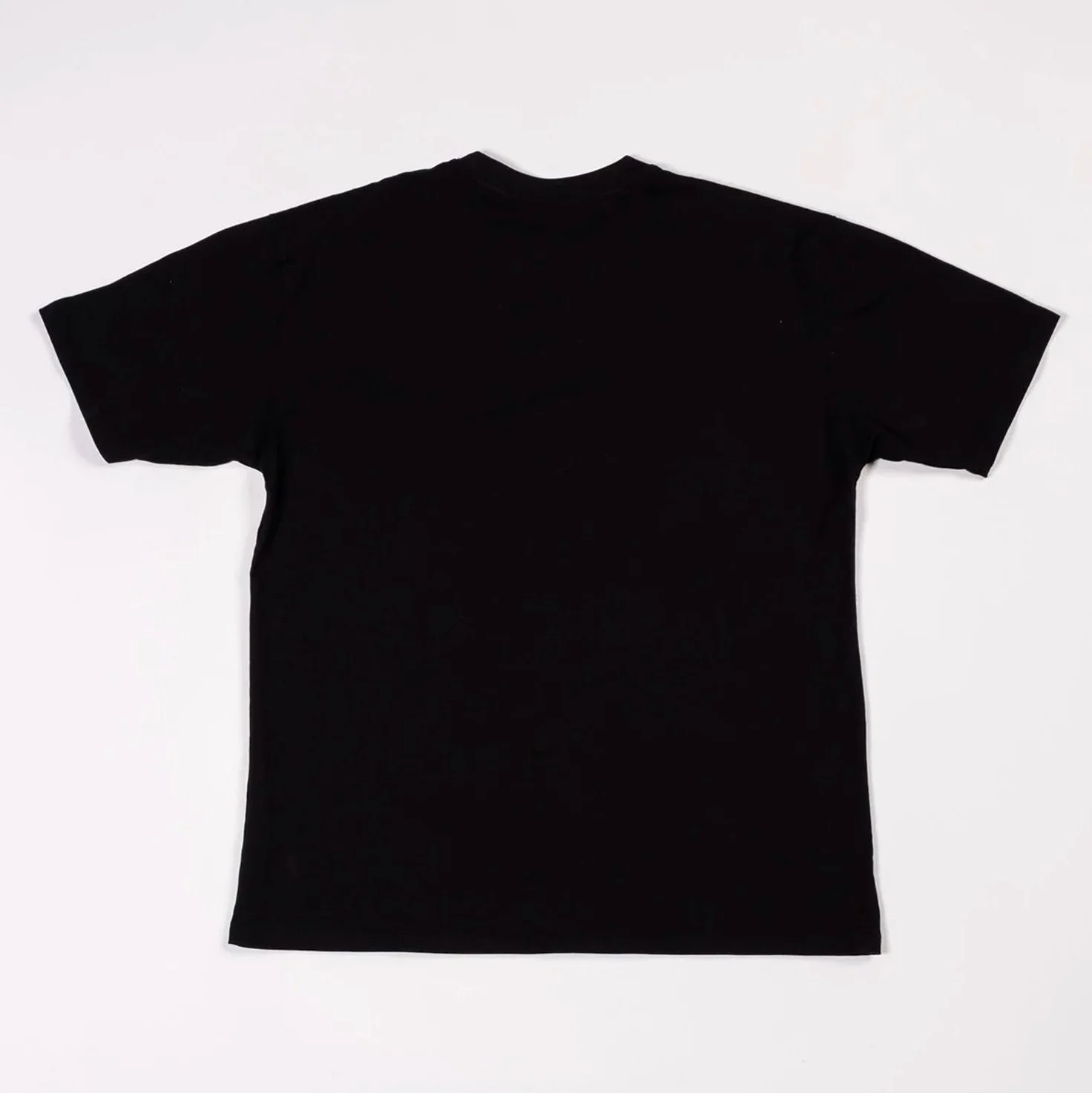 Back of black t-shirt with gloss black rectangular print on chest, concealing subtle text underneath