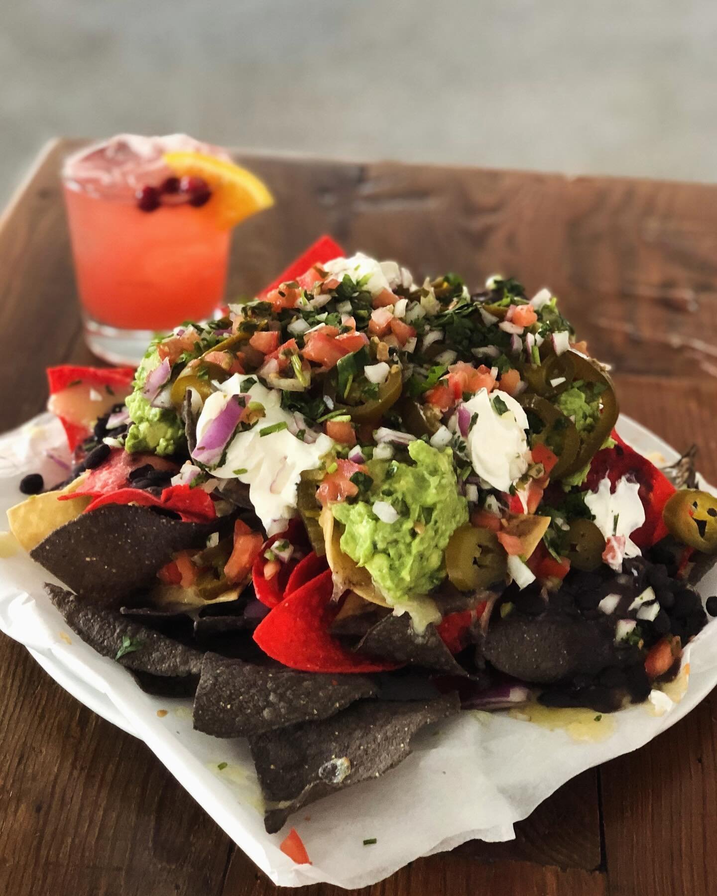It is Nacho Night at Santa Fe Woodstock!
Every TUESDAY, and only on Tuesdays, enjoy our amazing nachos! 
Tortilla chips piled high with white cheddar, black beans, guacamole, pico de gallo, jalape&ntilde;os, and sour cream.
Combine an order of nachos
