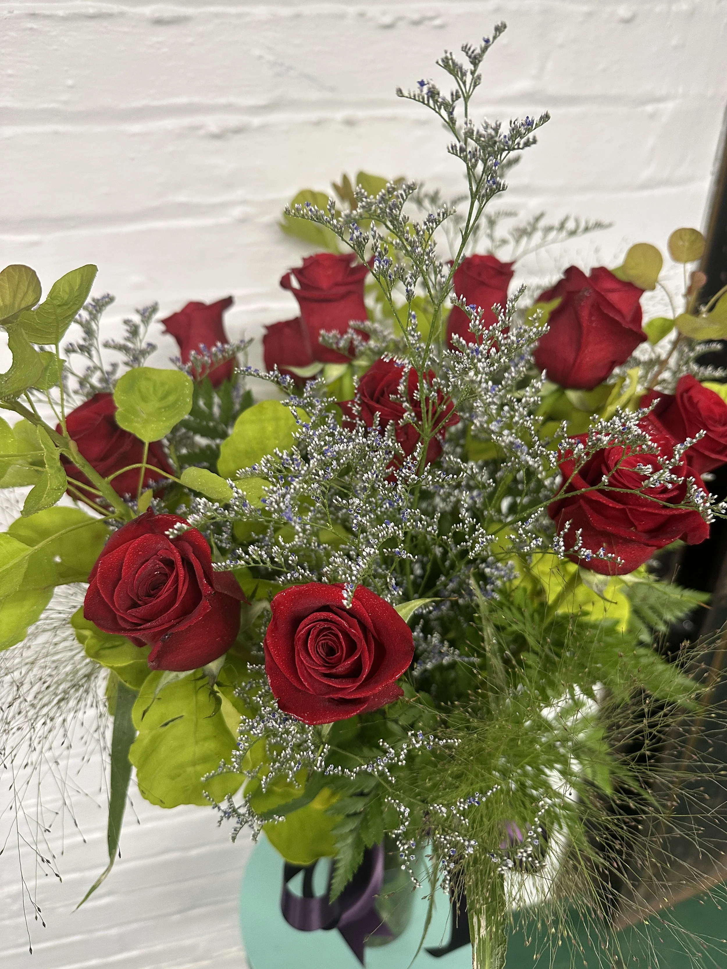A Dozen Red Roses in a Vase
