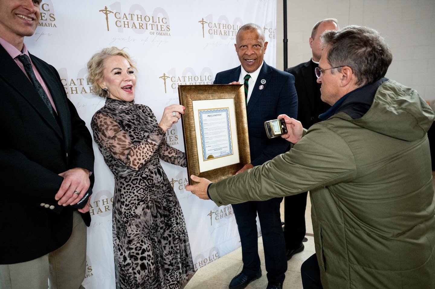 This job has led me to rooms I am honored to serve. The celebration + proclamation by the mayor of Omaha for the Catholic Charities centennial event. #eventphotographer #omahaphotographer #catholicphotographer #omaha