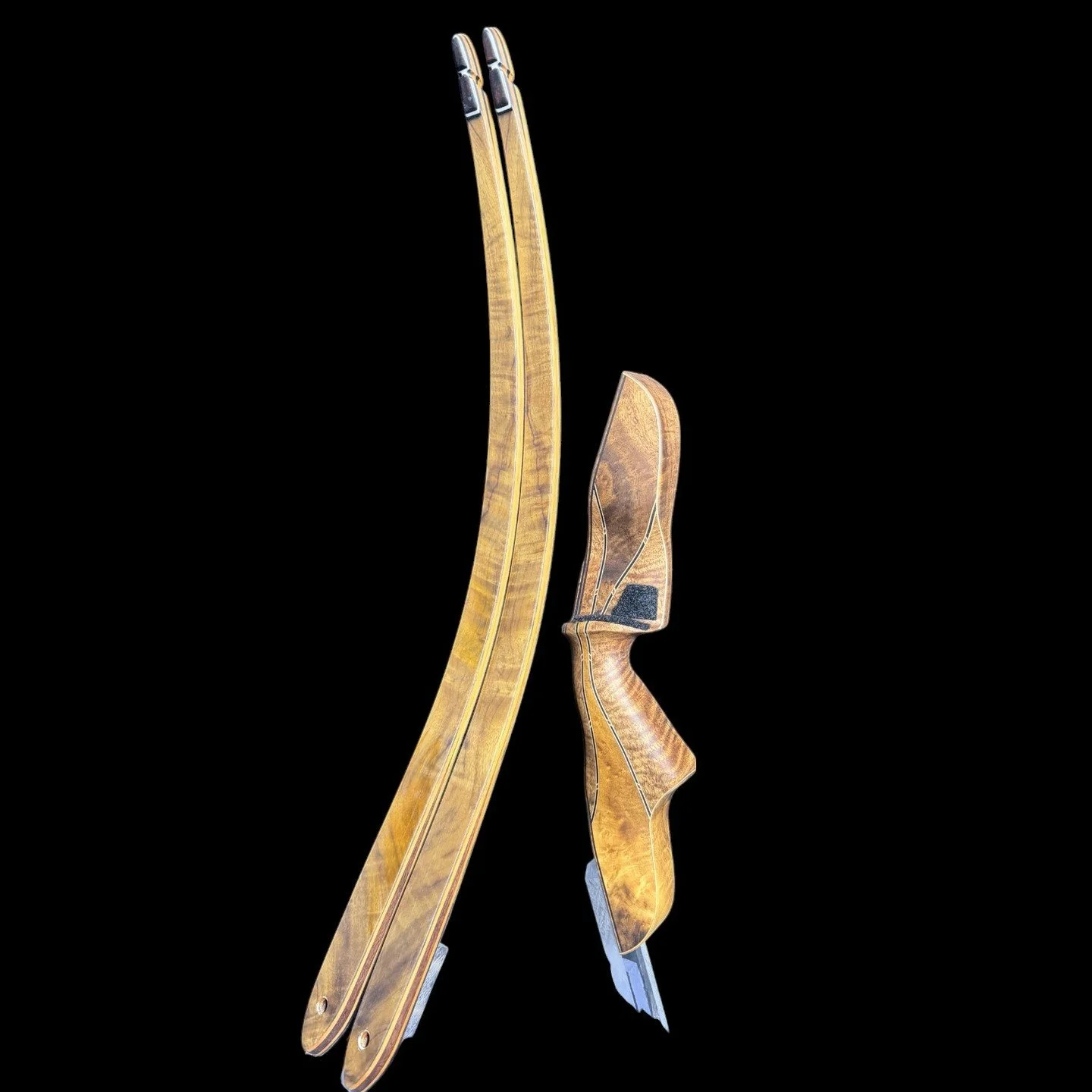 17K- Coyote FXT reflex/deflex longbow 62" 50# 28" $1,460 Curly myrtle and curly mango riser with medium grip, reflex/deflex longbow limbs with curly myrtle veneers, bamboo limb cores $1,460