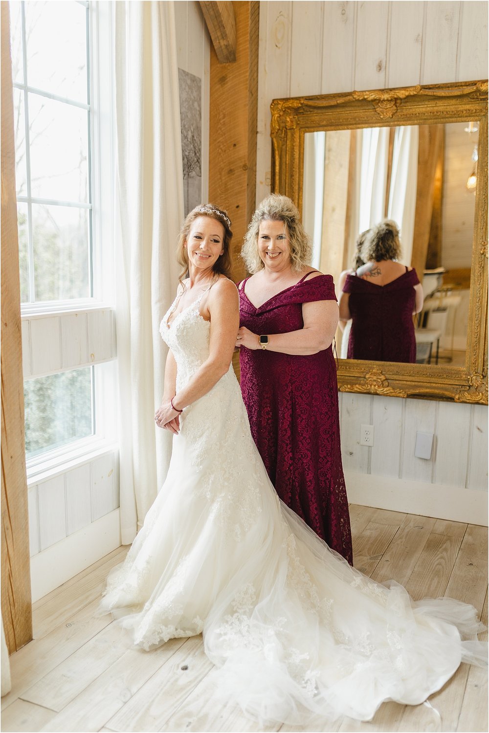 Maid of Honor Helping Bride Get Into Wedding Dress