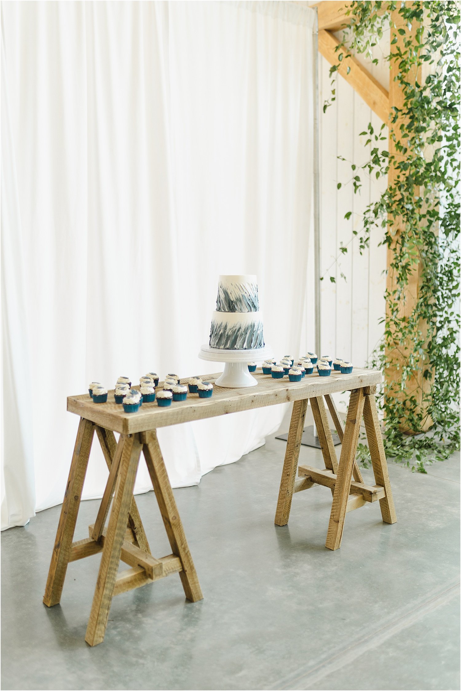 Blue Themed Cake and Cupcakes at Wedding