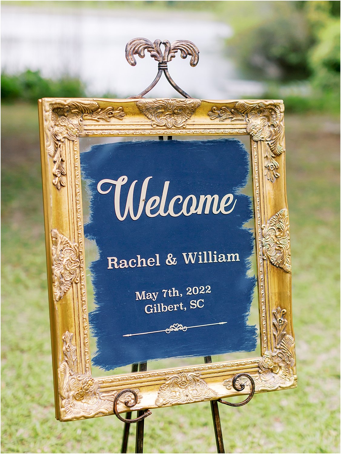 Blue and gold framed wedding welcome sign 