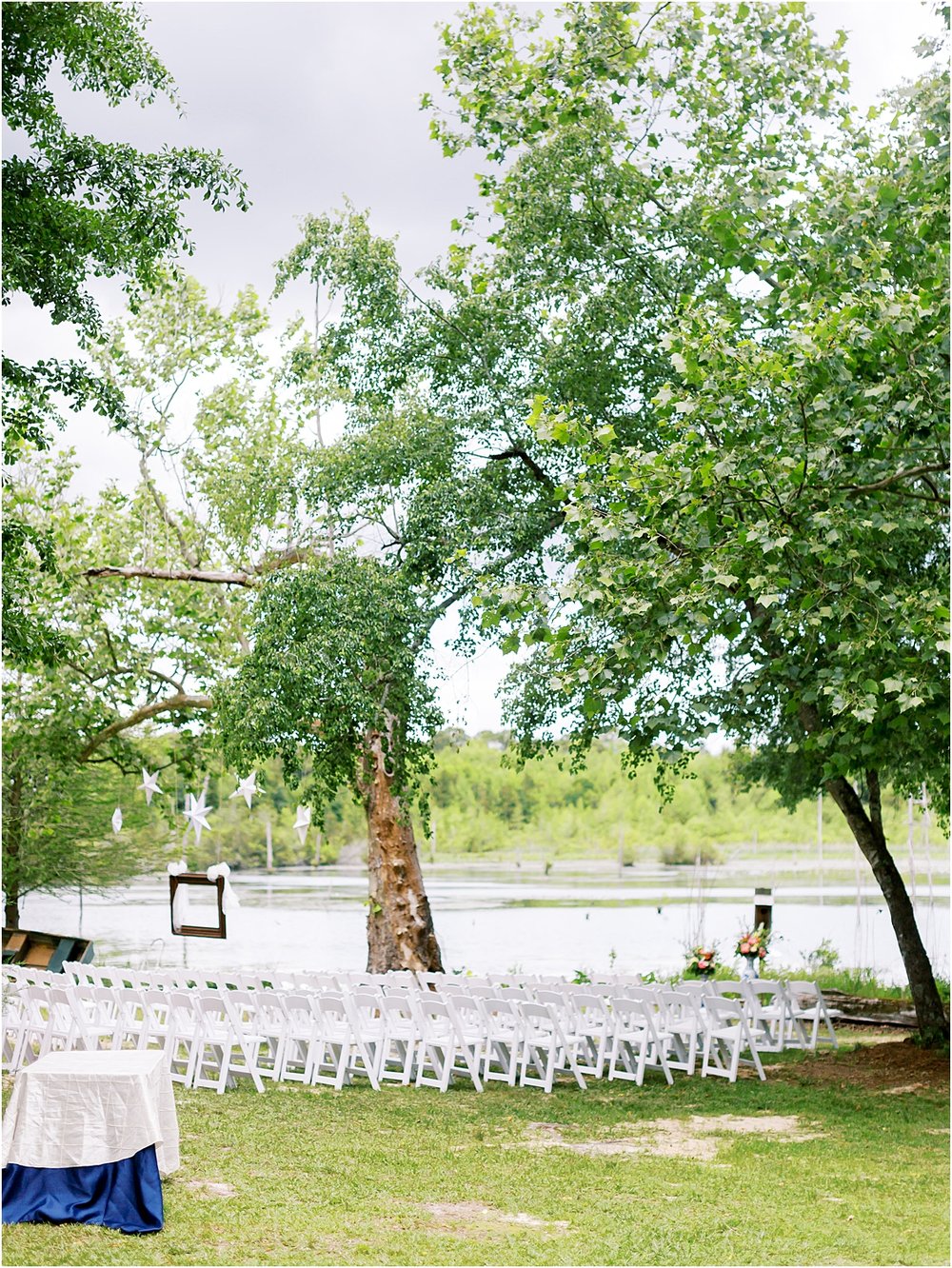 White garden chair waterfront wedding venue 