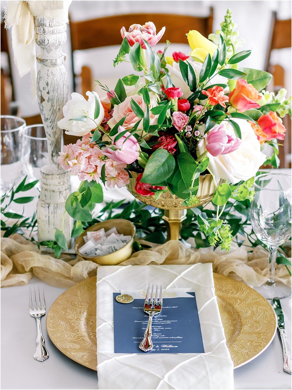 Summer wedding table decor with pops of pink and gold