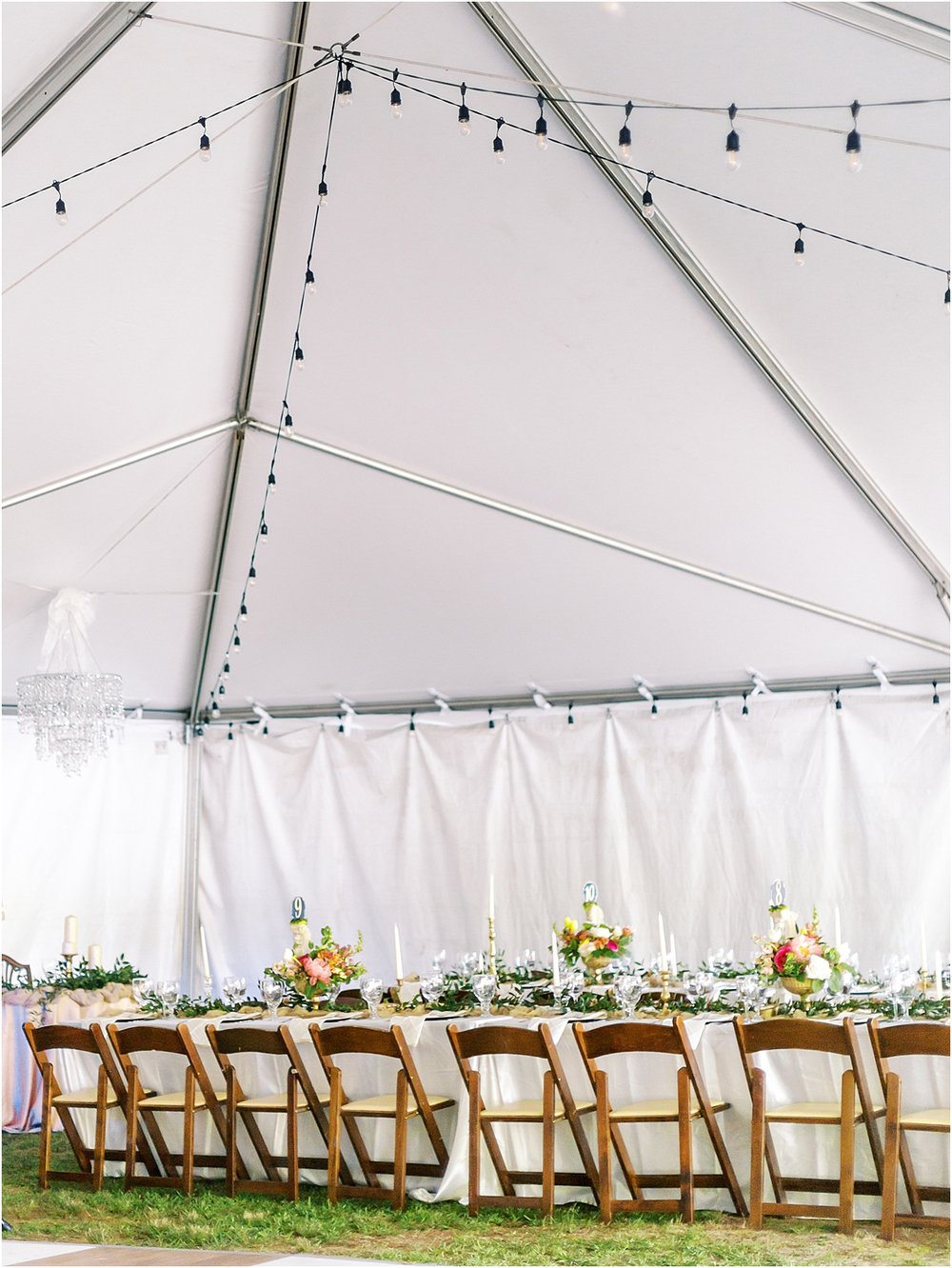 Tent with garden chairs reception table setup 