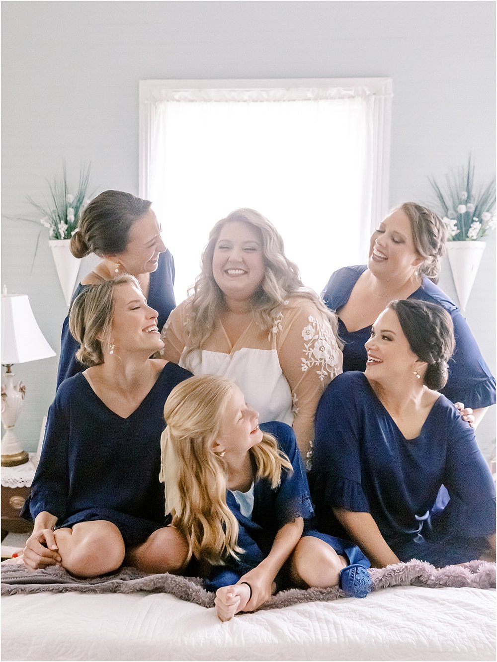Navy and white bridesmaid getting ready photos