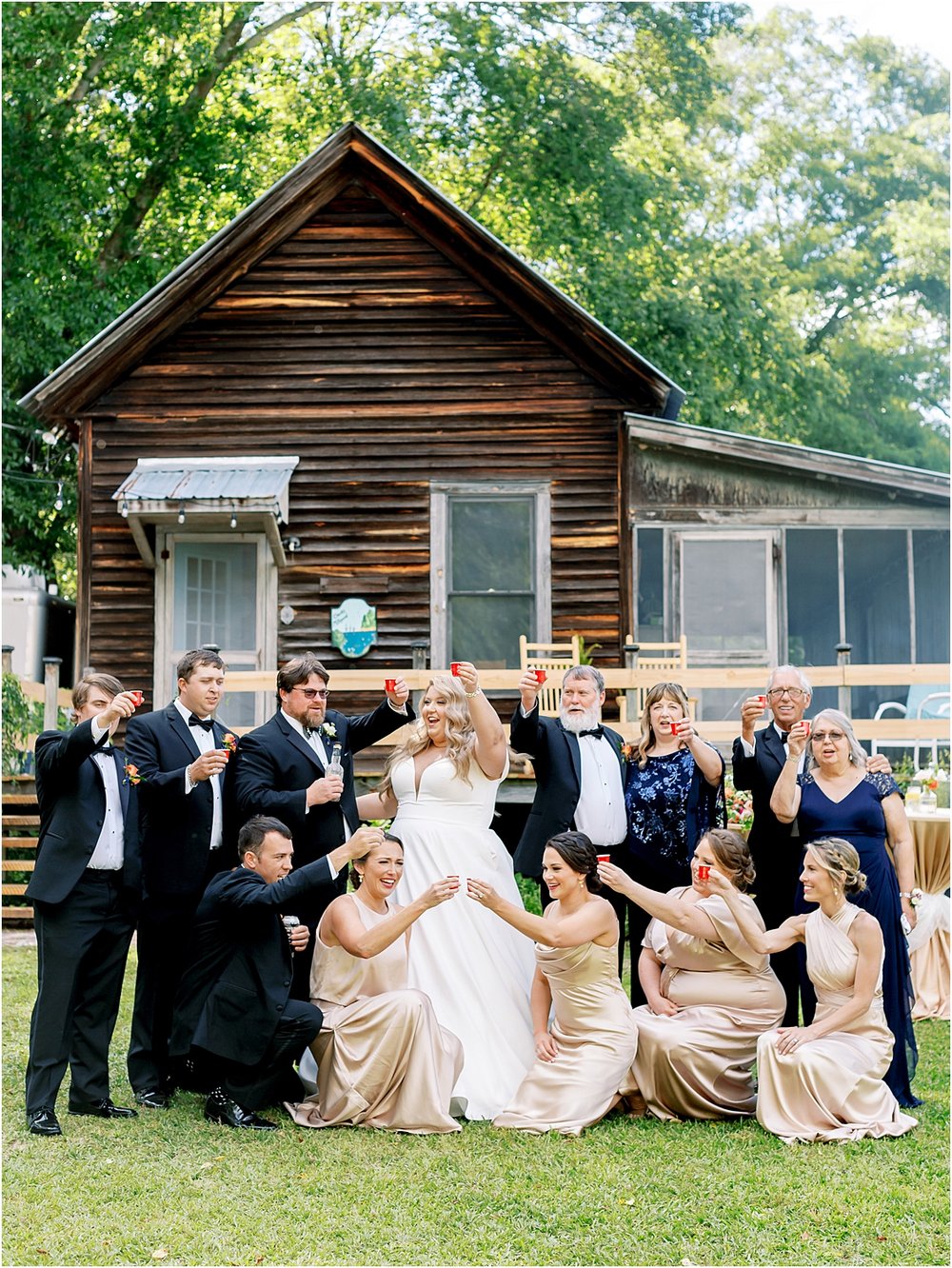 Cheers to the Bride and Groom bridal party photos