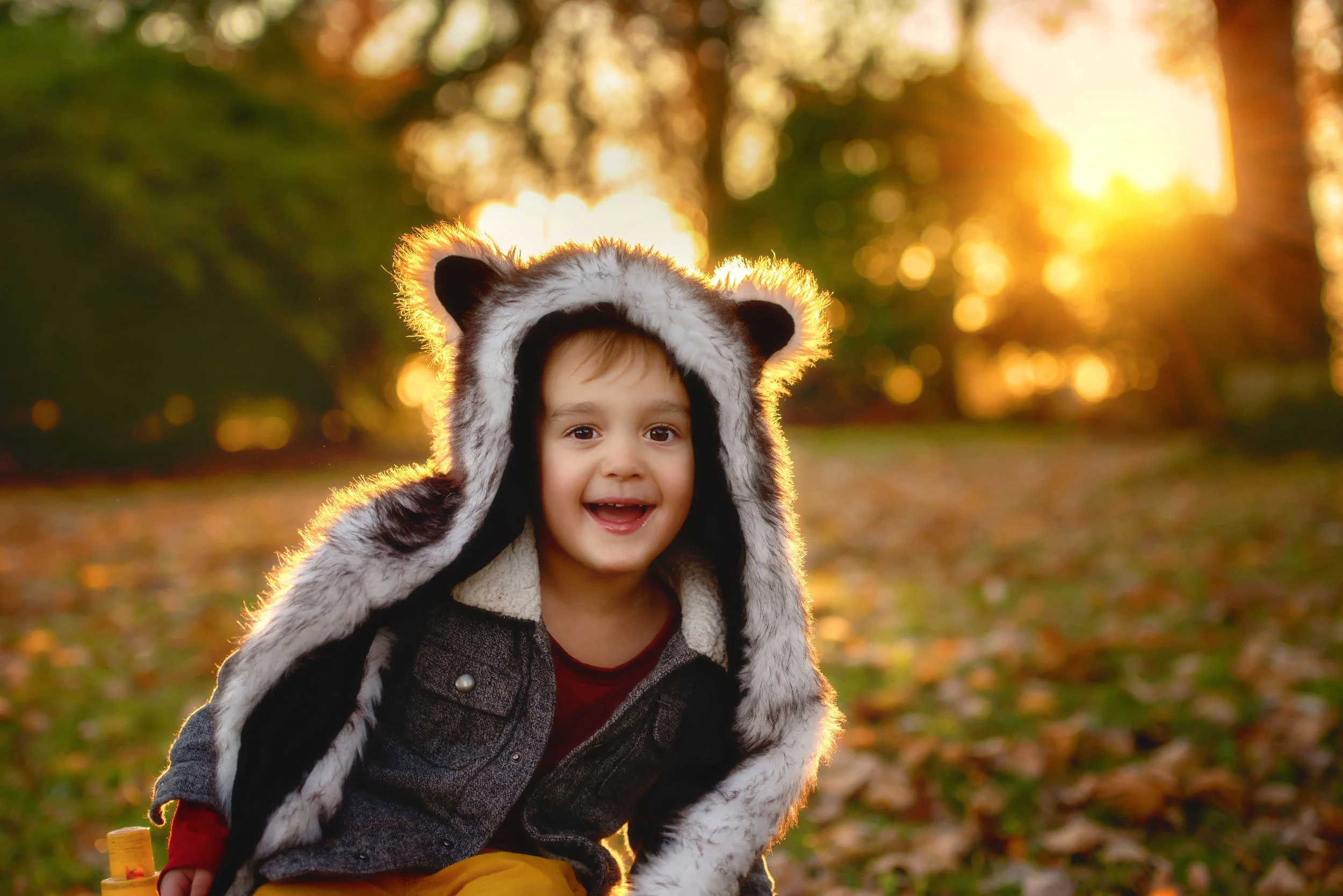 calgary children photographer boy wearing animal hat.jpg