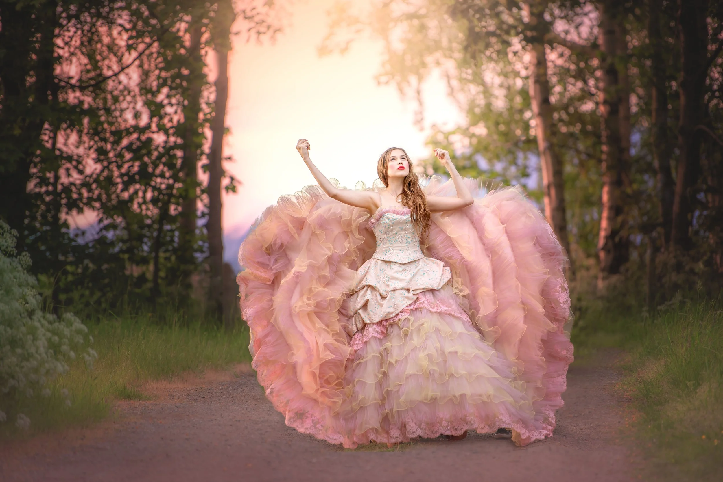 calgary children photographer Girl wearing pink and yellow dress.jpg