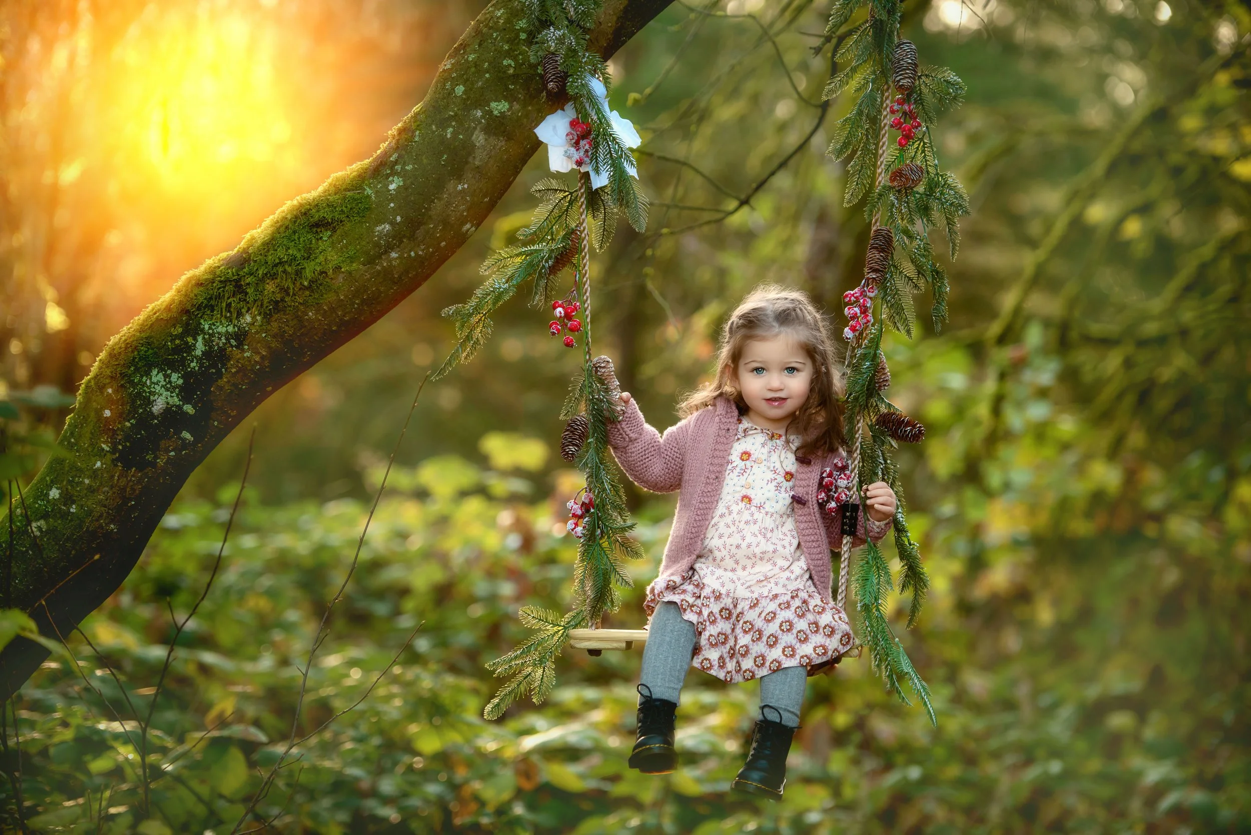 calgary children photographer girl on swing outside.jpg