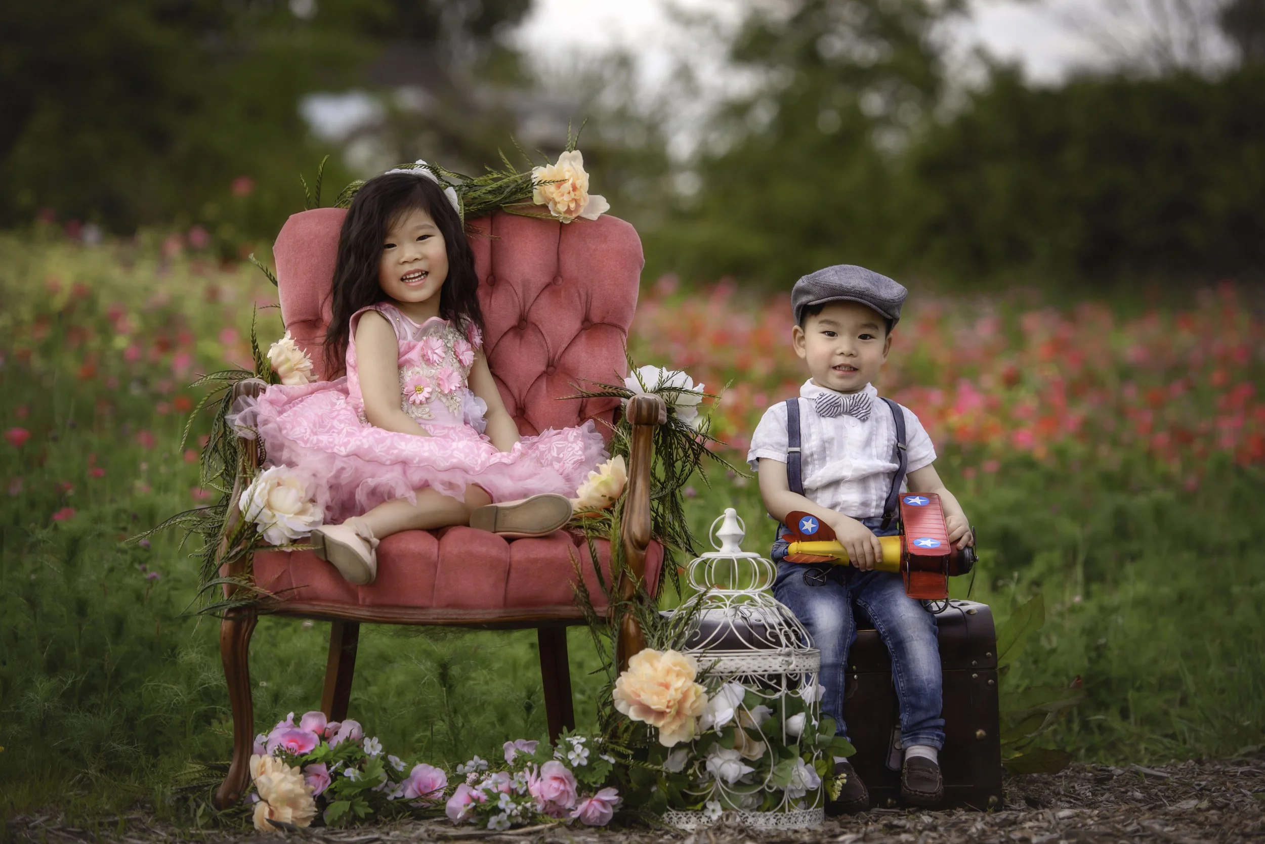 Calgary-family-photographer--borther sister sitting wildflowers.jpg