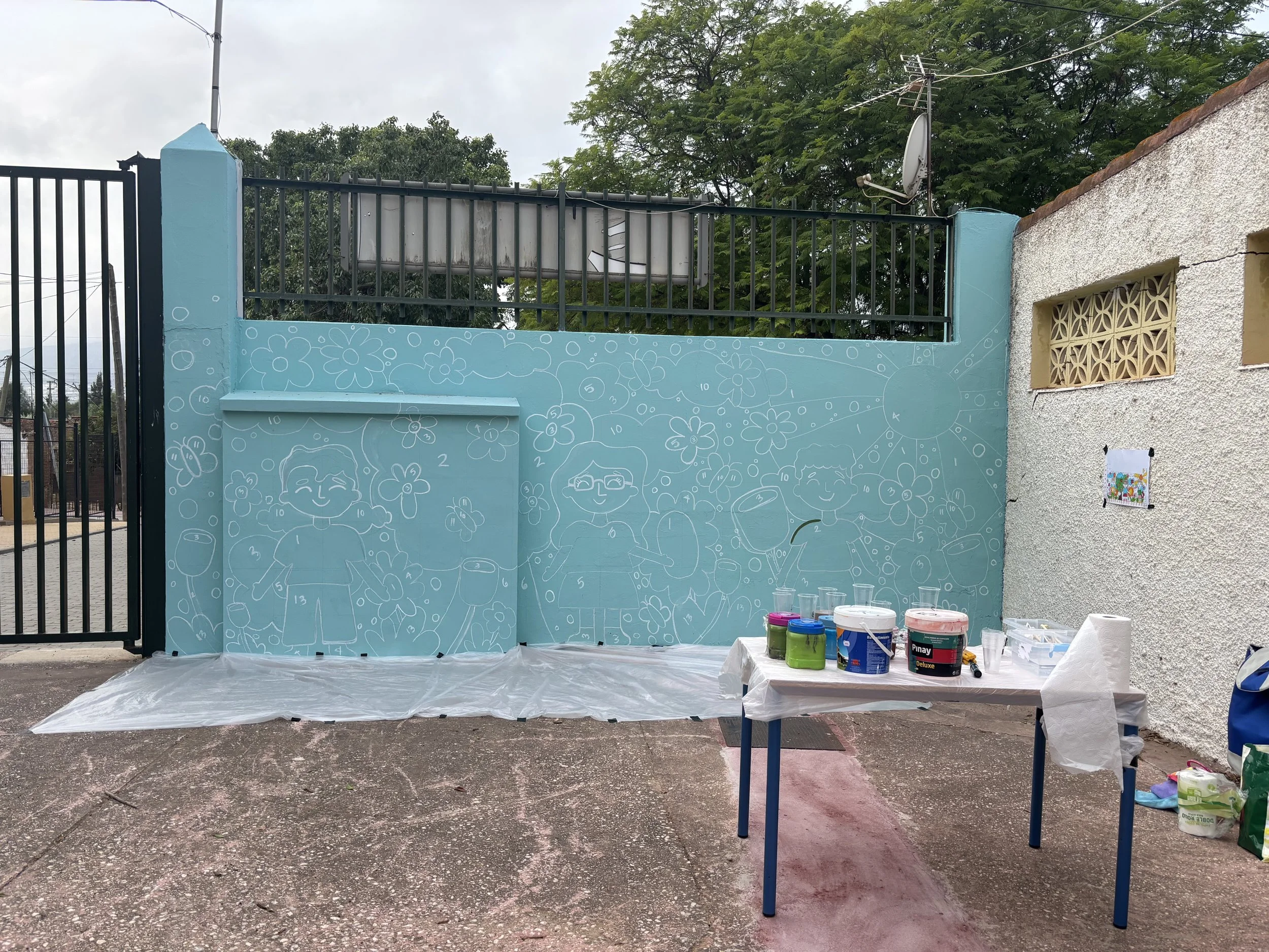 Before we start painting, we mix all of our paints and label them with their specific numbers. 