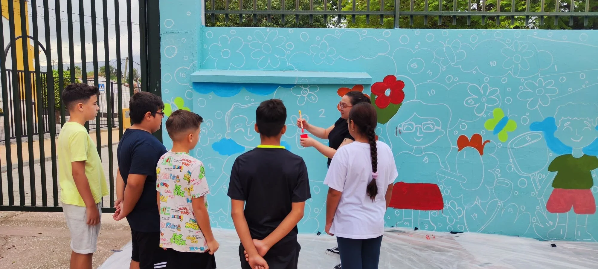 Before each group began painting, we gave them some painting tips and, most importantly, a reminder that paint can be painted over, so if paint drips or they make a little mistake, it is totally fine. The point of this project is for the students to 