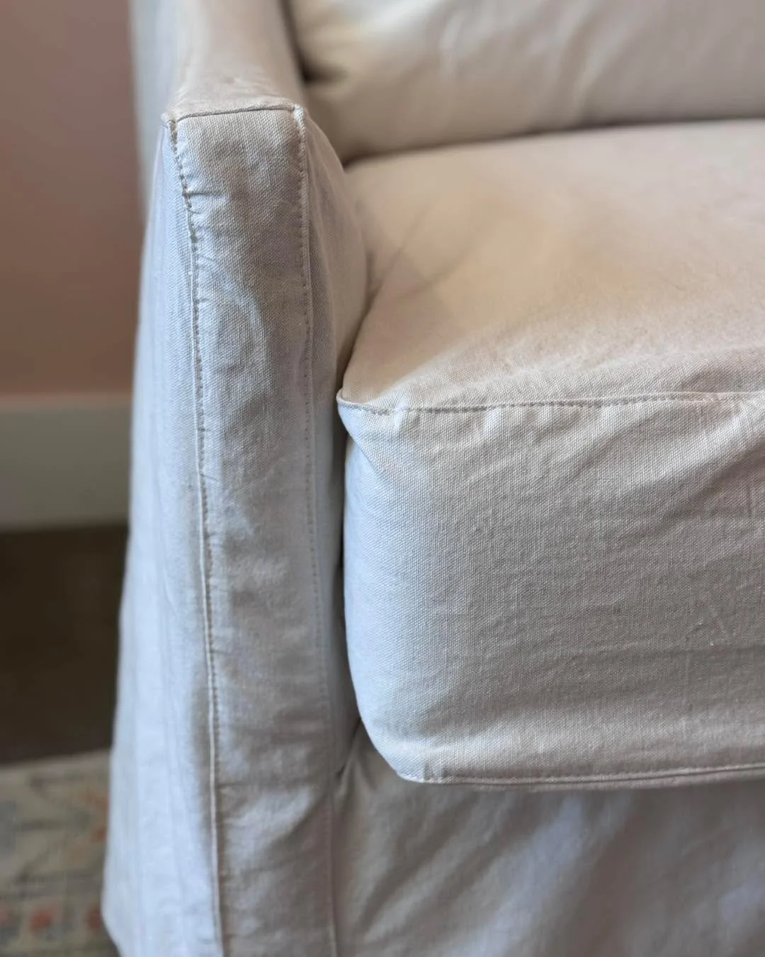Loose fit white denim canvas with topstitching. This chair is large and super comfortable but was a little formal. The client ordered something more casual that honored the simple lines of this chair. She didn&rsquo;t care about wrinkles and she want