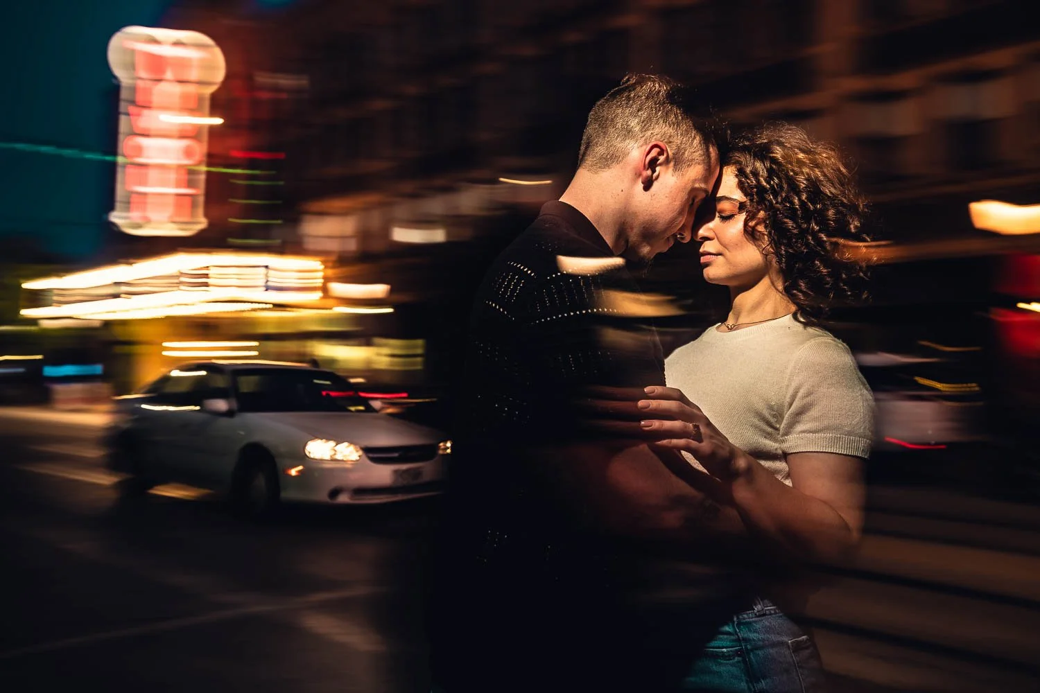 couple holding each other during engagement session-st louis engagement photographer