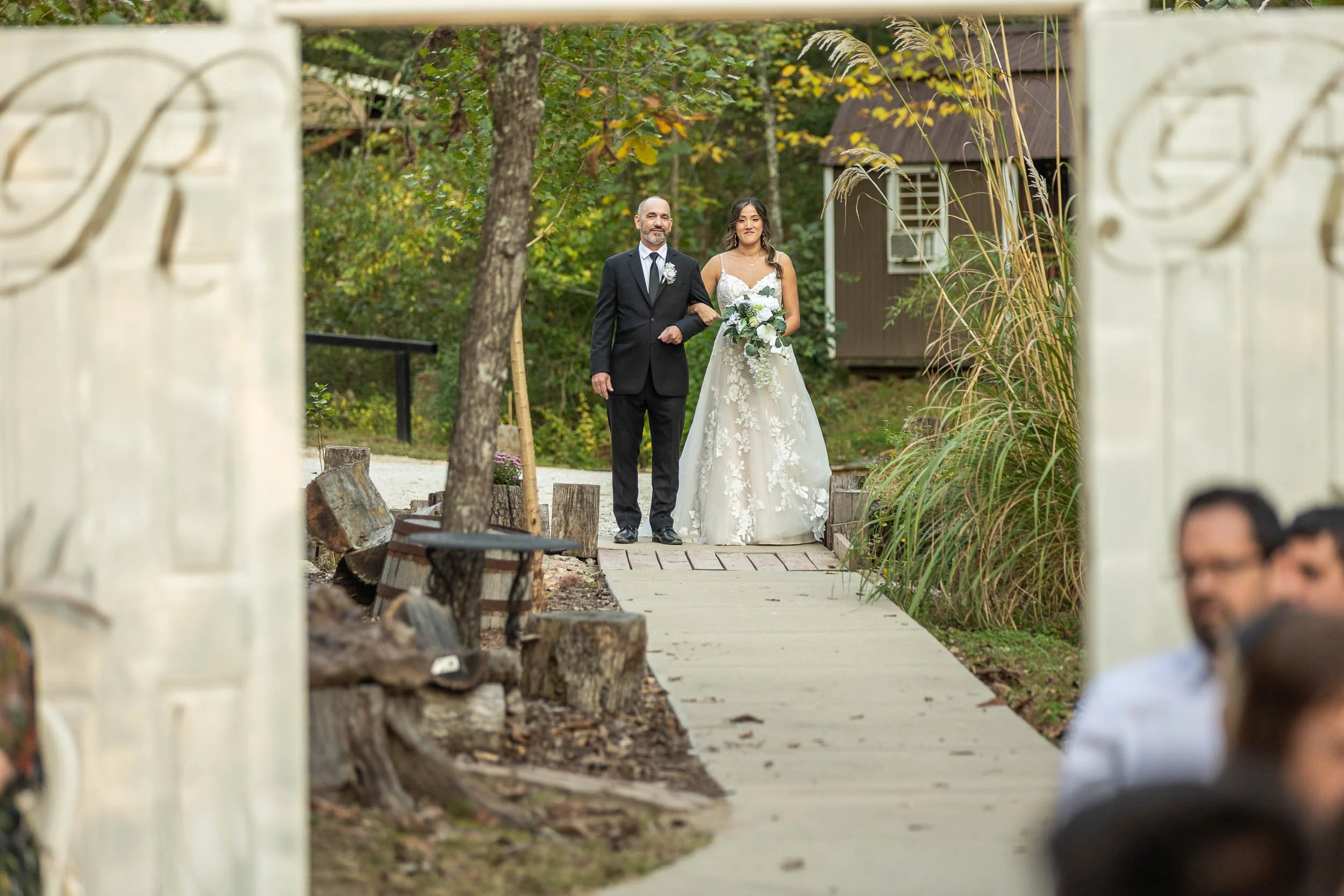 father of the bride walking his daughter down the center aisle_St Charles documentary wedding photography