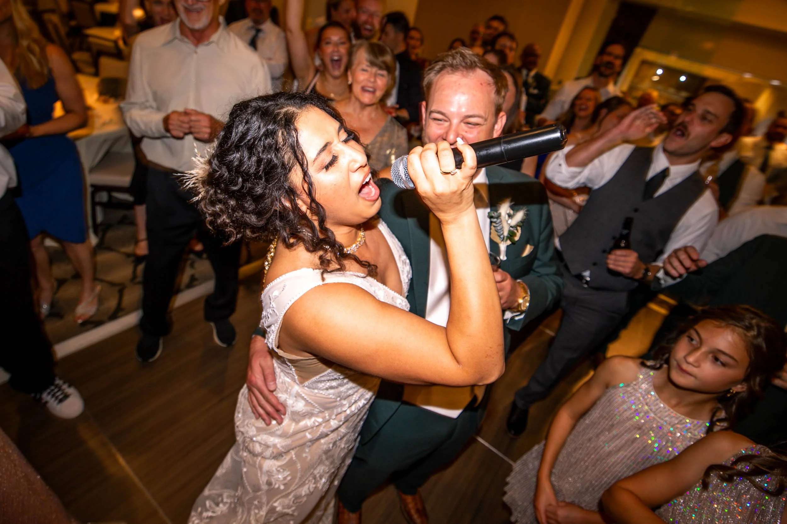 bride and groom getting groovy on the wedding reception dance floor at the Magnolia Hotel in St Louis