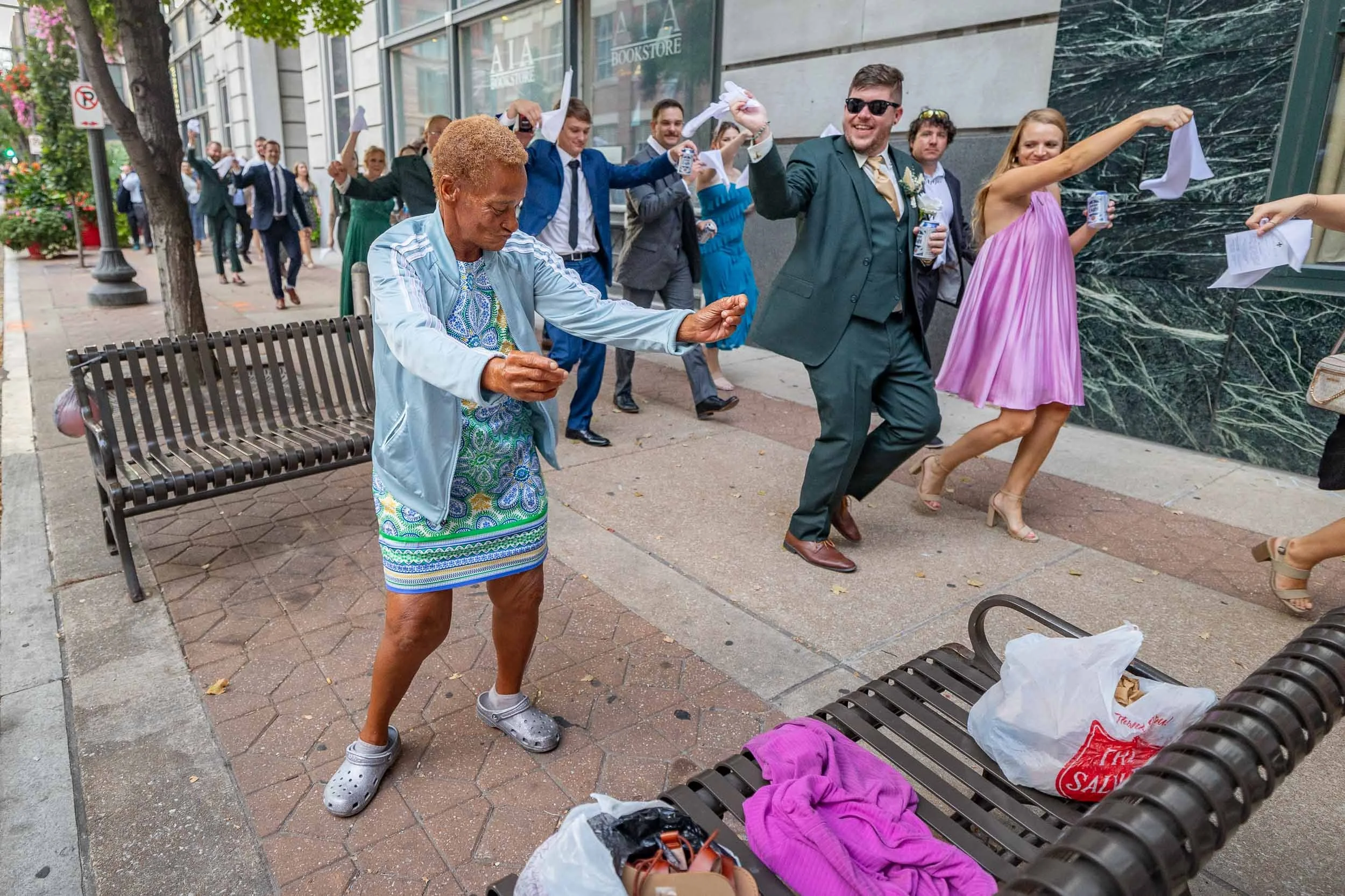 homeless lady dancing with second line walking down the st louis street