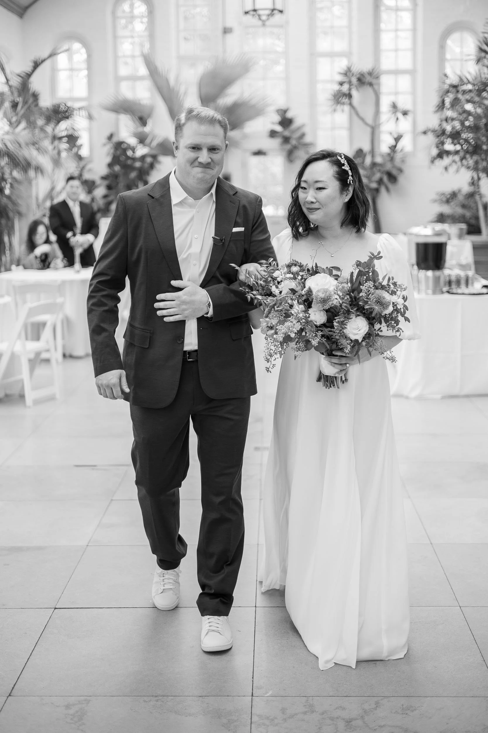 bride-groom-walking-down-aisle-saint-louis-wedding-photography.jpg