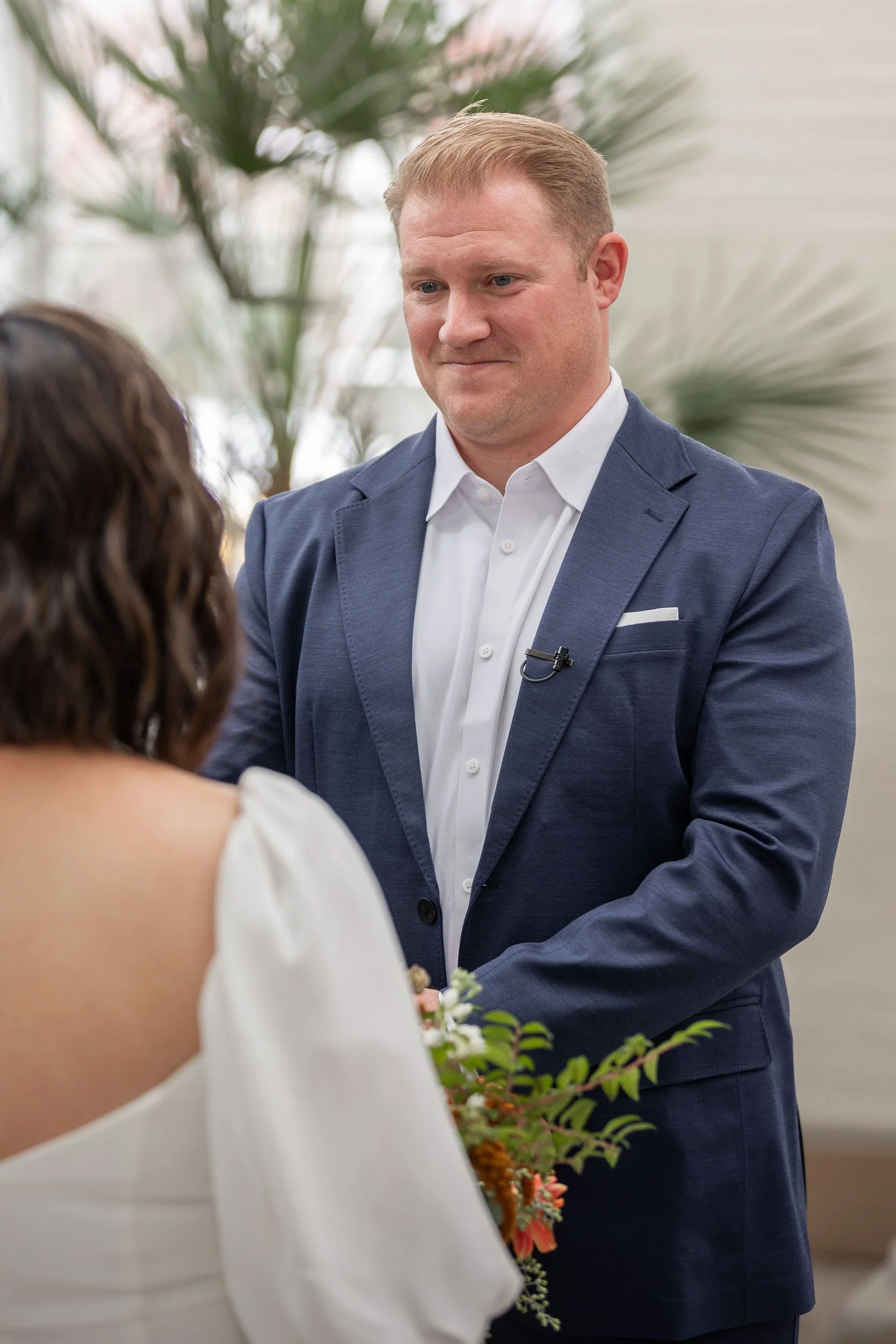 groom-smiling-at-alter-saint-louis-wedding-photography.jpg