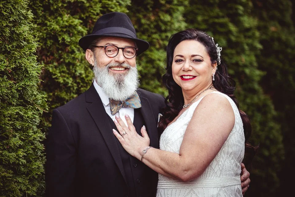 bride and groom smiling for wedding portrait-the mcpherson wedding photographer