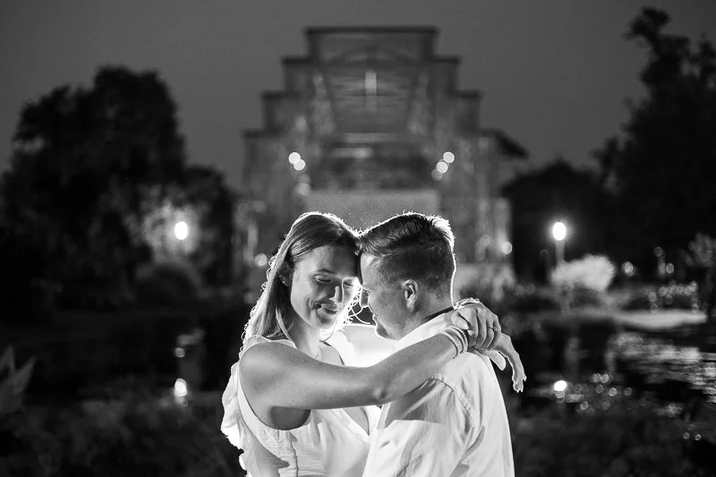 woman holding man close with her arms wrapped around him-saint louis Jewel Box photography