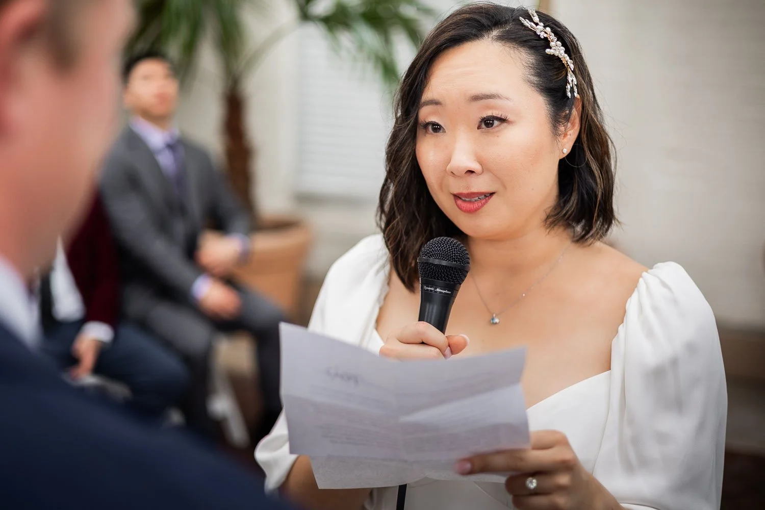 woman saying her vows to her future husband at their wedding - Piper Palm House wedding photographer