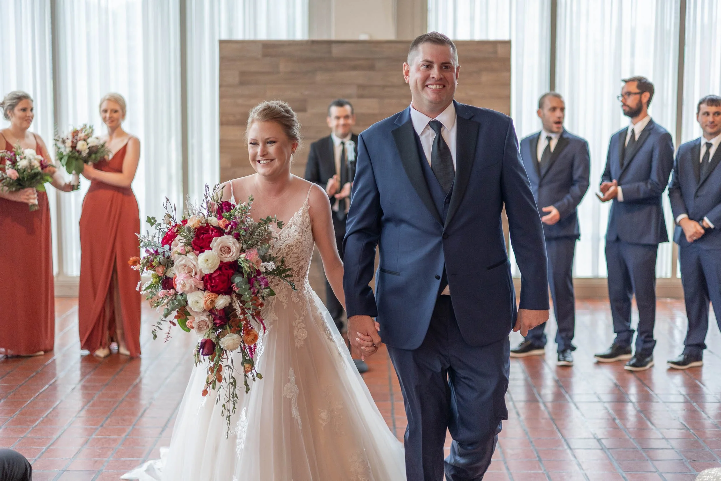 bride and groom married walking down the isle, josh and lindsey photo