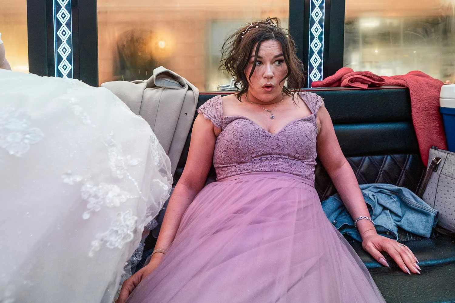 bridesmaid about to pass out on party bus-st louis documentary wedding photography