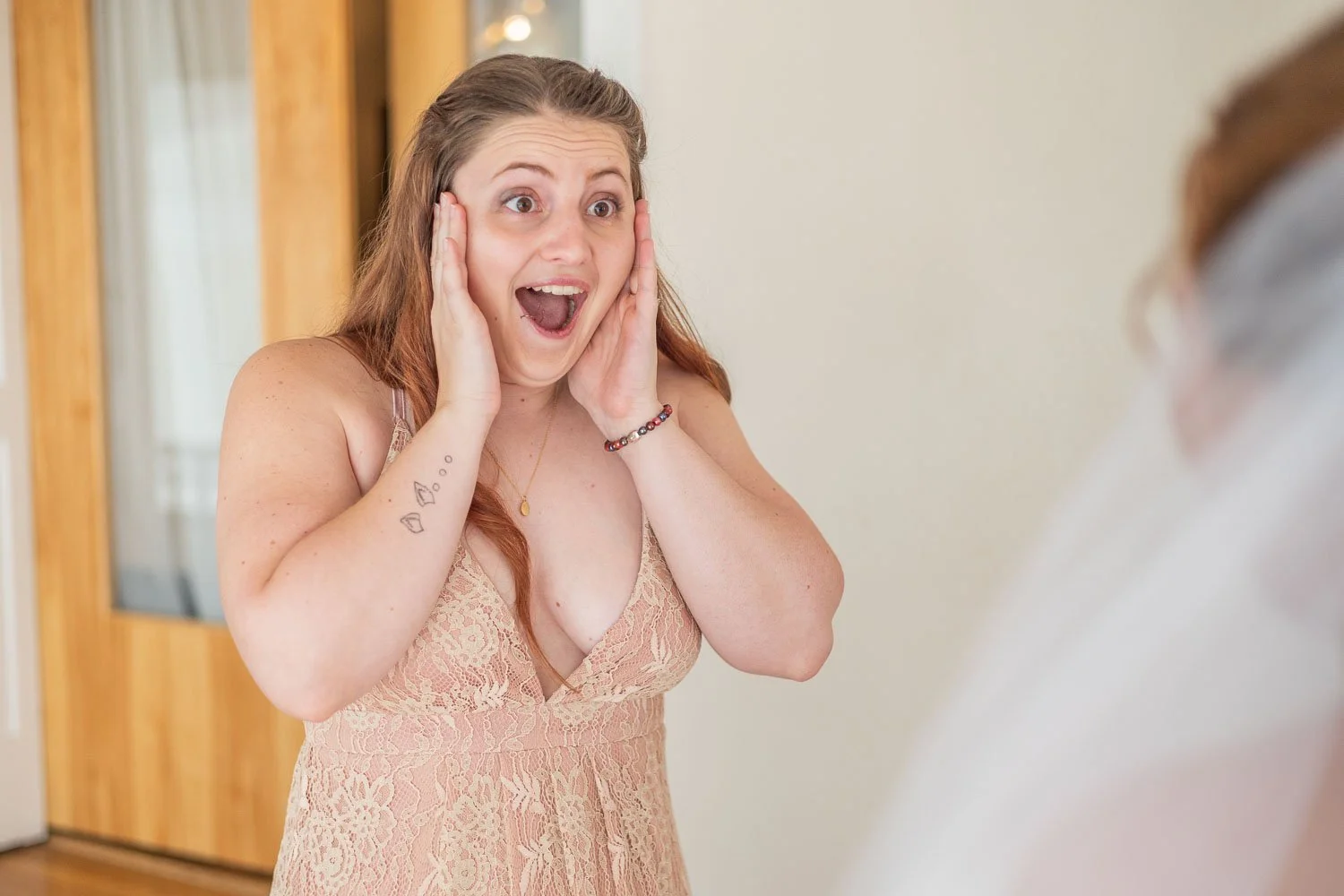 bridesmaid shocked to see bride in her wedding dress - boo cat club wedding venue
