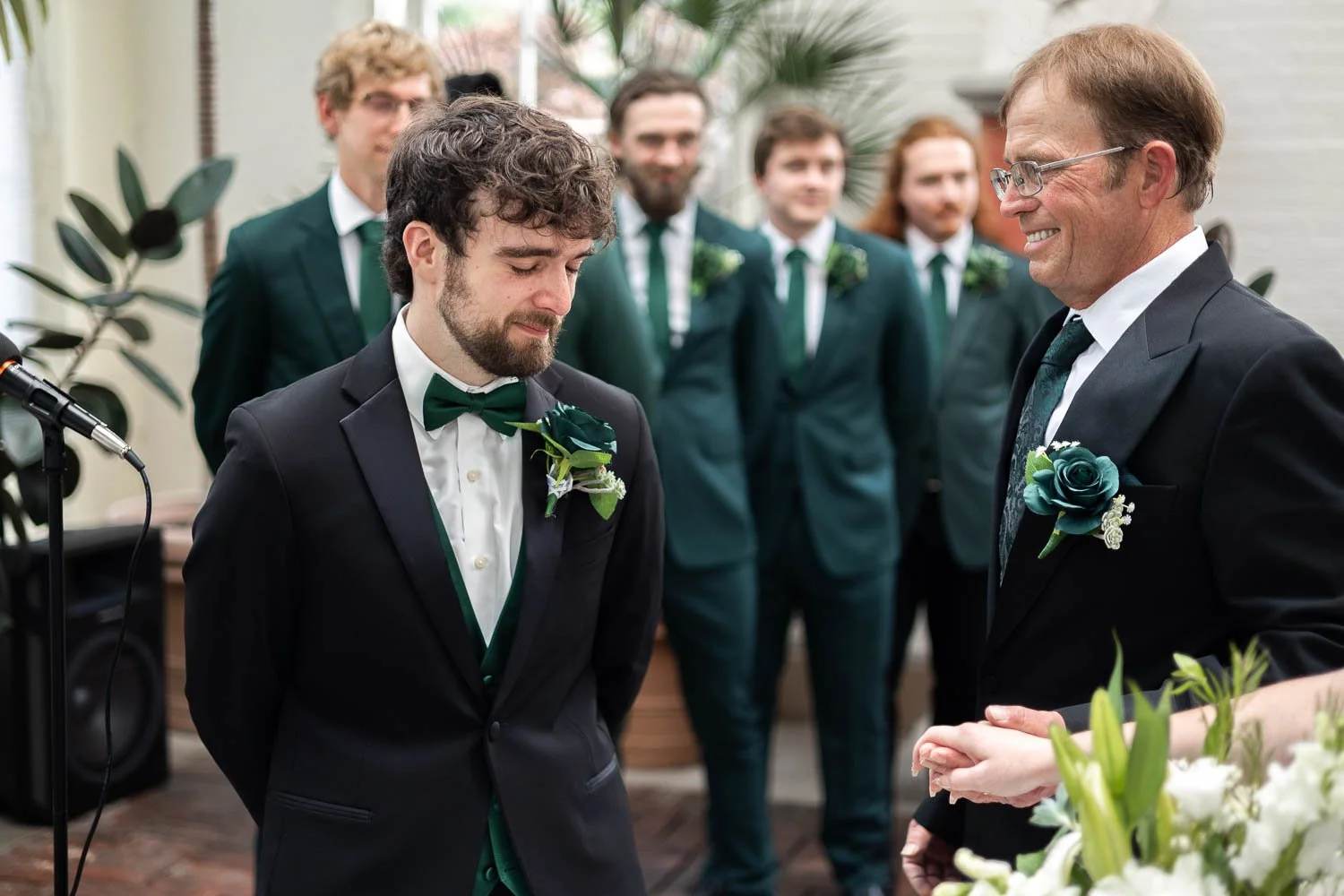 groom crying as bride walks down the wedding aisle-professional st louis wedding photography