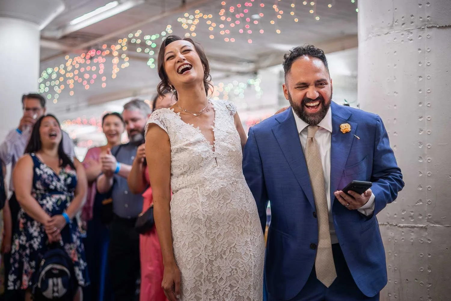 couple laughing during wedding reception speeches_josh and lindsey photo