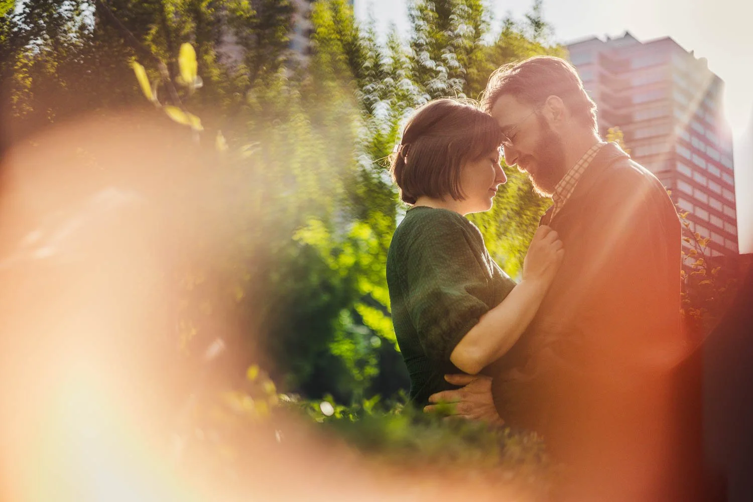 couple holding each other during their st louis engagement session