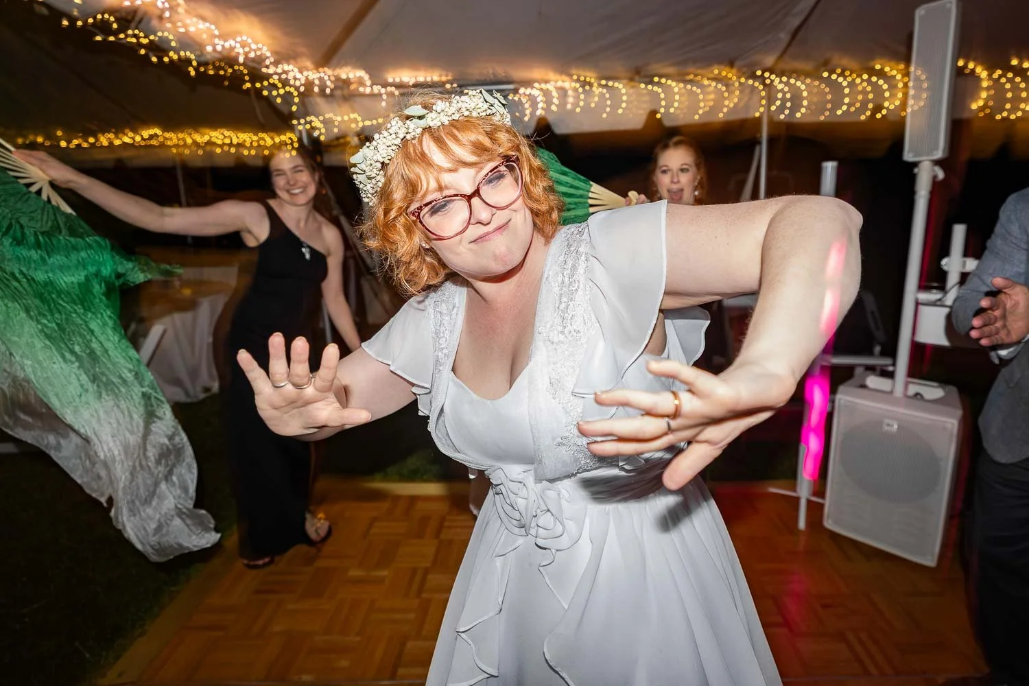 bride dancing on wedding reception dance floor surrounded by her bridesmaid-josh and lindsey photo