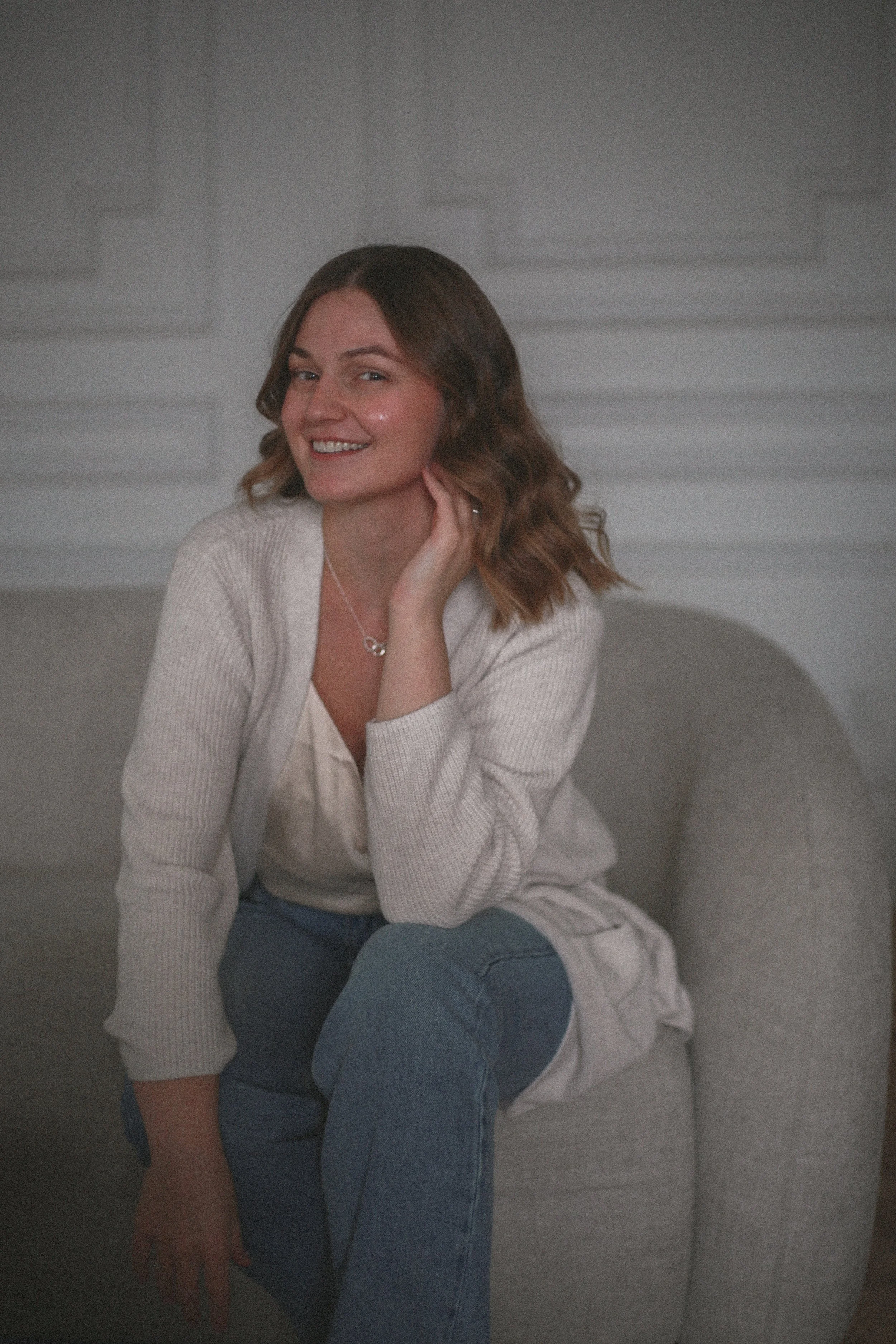 Woman with blonde hair smiling at camera