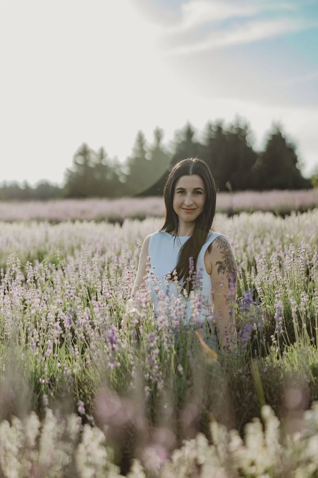 Woman with dark hair in lavender field